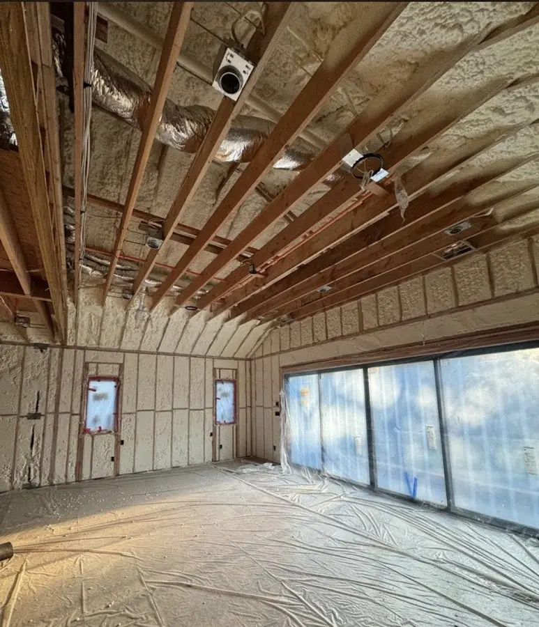 Interior walls and ceiling insulated with spray foam during new construction in North Aurora